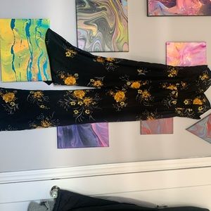 Black romper with yellow flowers